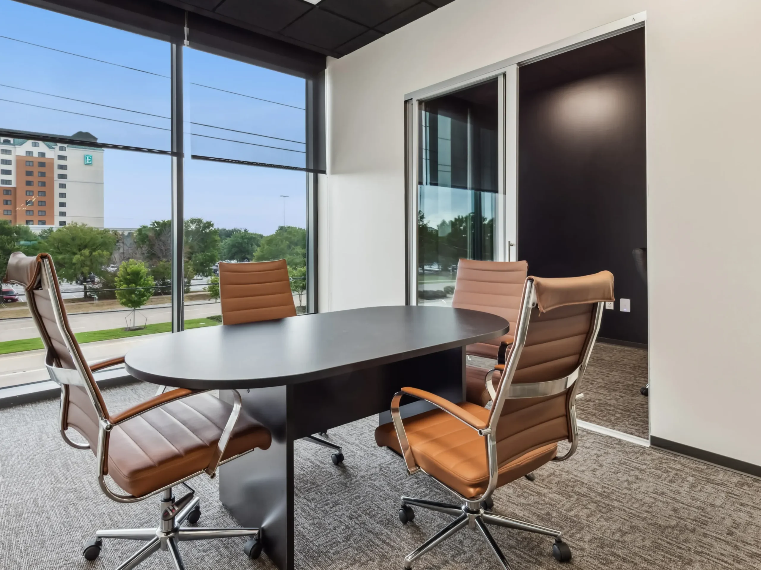 Lucid Private Offices Grapevine reception area with modern circular desk and private office suites