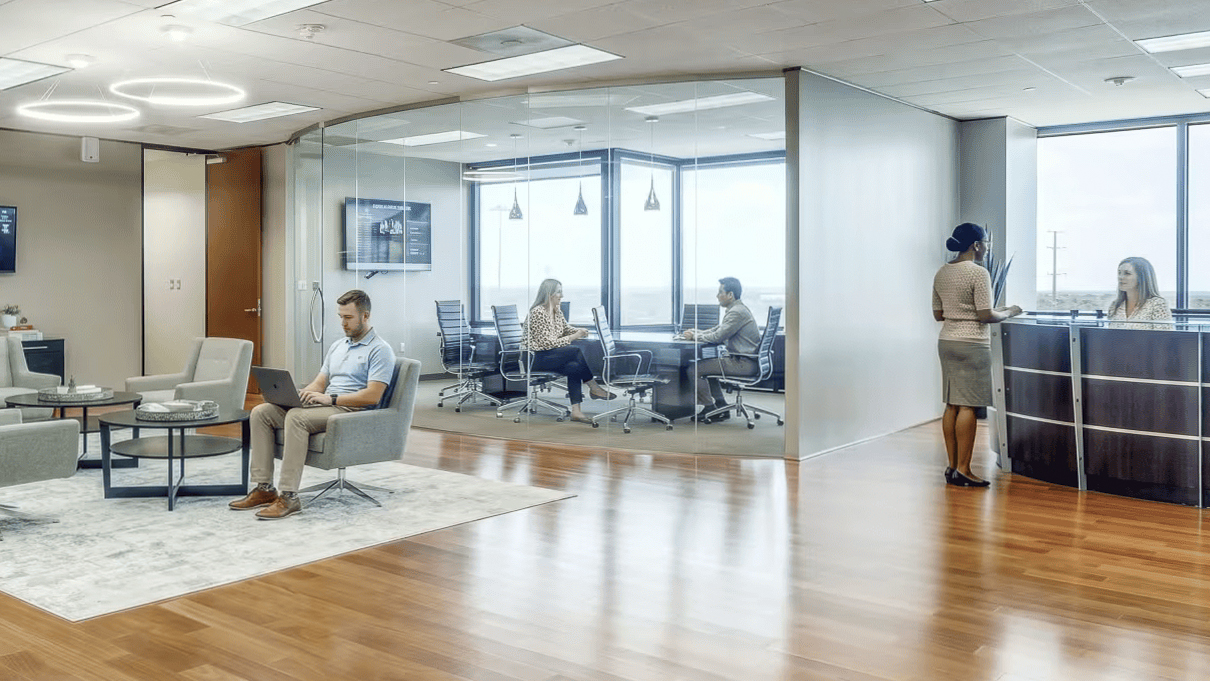 Lucid Private Offices Galleria/Addison lounge with open seating, meeting rooms, and bright workspace.