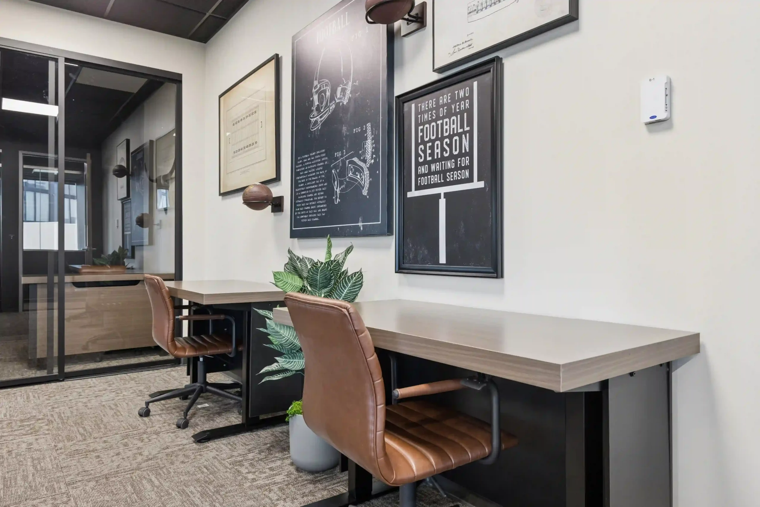 Private office with desk and wall art at Lucid Private Offices Nashville